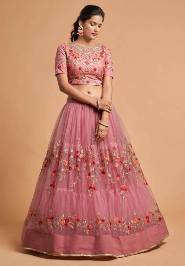 Aastha Fashion Women s Incredible Dusty Pink Thread Embroidered Net Function Wear Lehenga Choli Online