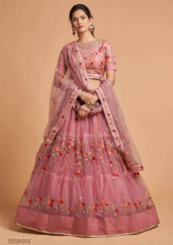 Aastha Fashion Women s Incredible Dusty Pink Thread Embroidered Net Function Wear Lehenga Choli Online