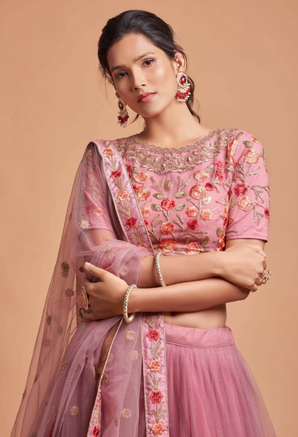 Aastha Fashion Women s Incredible Dusty Pink Thread Embroidered Net Function Wear Lehenga Choli Online